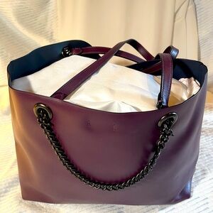 NWOT COACH handbag- deep plum, grey chain on handle. Never used- lots of room!
